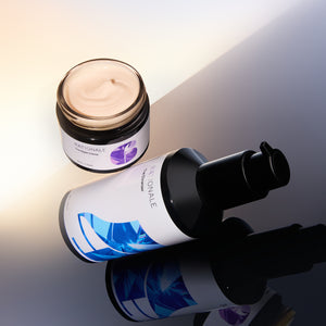 The Repair nightly duo formulations modelled in an illuminated background.